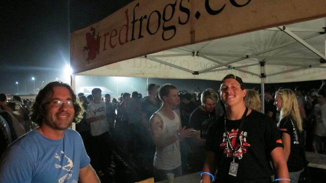 Red Frogs volunteers Kevin Stickl and Bryan Klenkel help students of 2011 celebrate Schoolies safely in Byron Bay. Picture: Dominic Feain