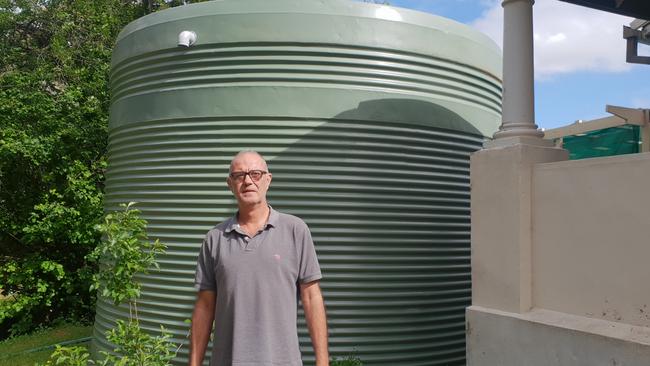 Branko Soda says his neighbour’s installation of the giant rainwater tank has caused anxiety and stress. Picture: Colin James