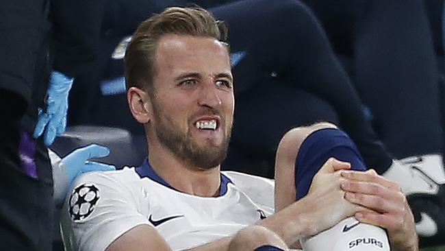 Tottenham Hotspur's English striker Harry Kane receives medical treatment. Picture: AFP