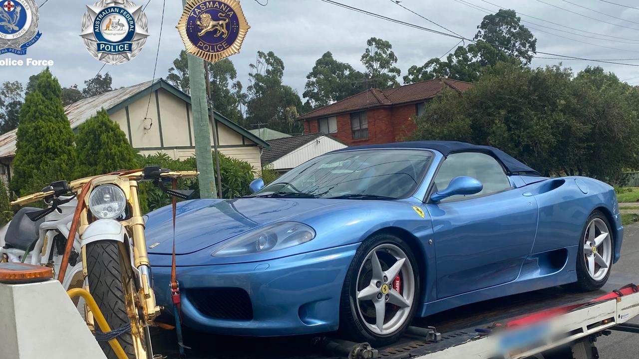 A 37-year-old NSW man has been arrested and extradited to Tasmania charged with trafficking. Four luxury vehicles and a motorcycle valued over $2m have been seized by police. Picture: Tasmania and NSW Police.