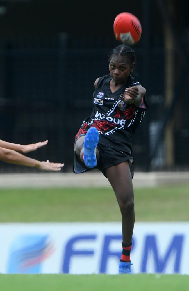 Tiwi Bombers Maria Rioli plays against Palmerston Magpies in round one of the NTFL 22/23 season. Picture: Amanda Parkinson