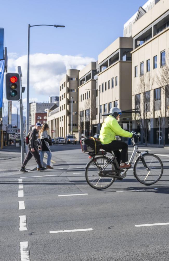 Cyclist on the intersection of Collins and Barrack Street. Picture: Caroline Tan