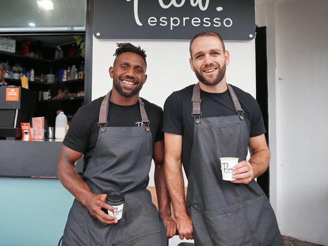 Former Dragon Jason Nightingale (right) and former Cronulla player James Segeyaro at their cafe, Flow Espresso, in Kogarah. Picture: Sam Ruttyn