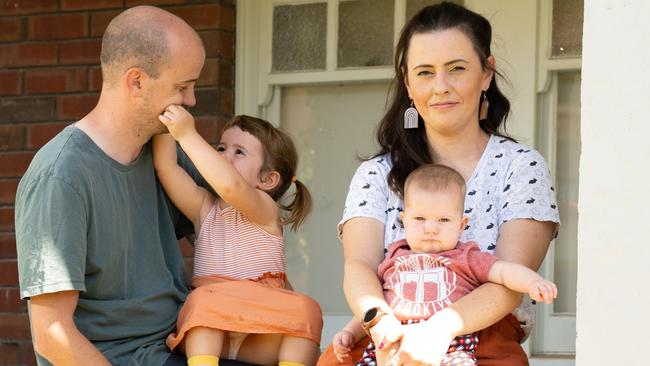 Simon Rawnsley, baby Una, Maeve, 3, and Jessica O’Neill will benefit from the federal government’s childcare boost. Picture: Morgan Sette