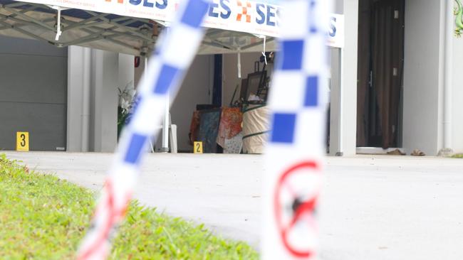 Crime scene markers inside the garage of the Scullen Ave address. Picture: Peter Carruthers