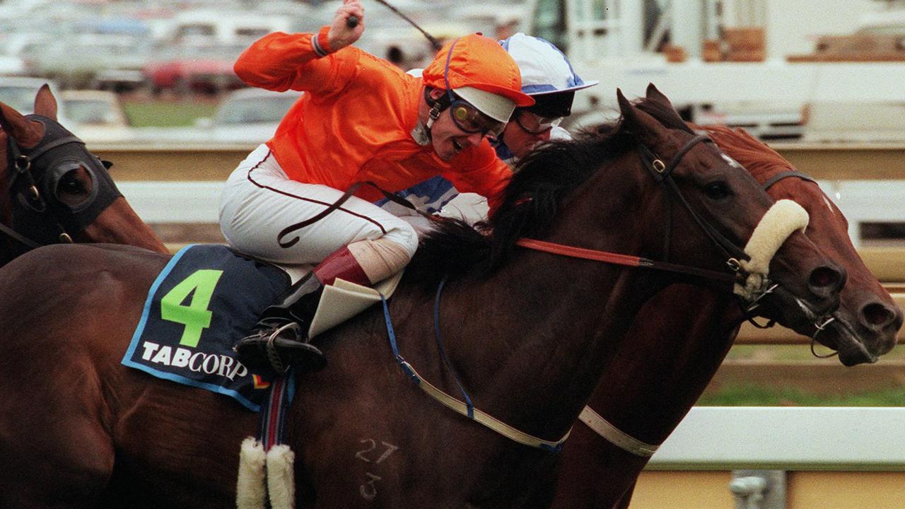 Alfa ridden by Jockey Rod Griffiths, storms down the outside to win the Caulfield Guineas (1600m) on Oct 12 1996  Sport horseracing Vic action