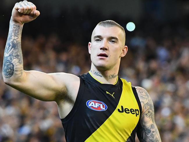 MELBOURNE, AUSTRALIA - SEPTEMBER 23:  Dustin Martin of the Tigers celebrates winning the Second AFL Preliminary Final match between the Richmond Tigers and the Greater Western Sydney Giants at Melbourne Cricket Ground on September 23, 2017 in Melbourne, Australia.  (Photo by Quinn Rooney/Getty Images)