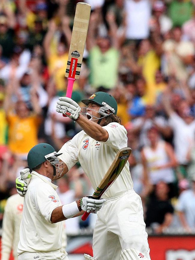 Andrew Symonds celebrates his century with Matthew Hayden at the 2006 Boxing Day Test.