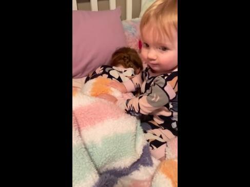 Adorable moment toddler wakes up her blind older sister