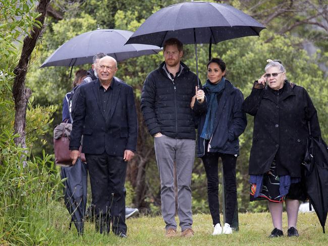 The royal pair go casual during a rainy visit to the Abel Tasman National Park. Picture: AP