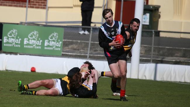 Cam Walter leaves opponents in his wake after taking a strong mark. Picture: cmwphotography