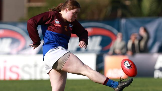 Mairead Csar gets a kick for Banyule. Picture: Hamish Blair