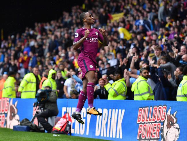 Manchester City's English midfielder Raheem Sterling celebrates.