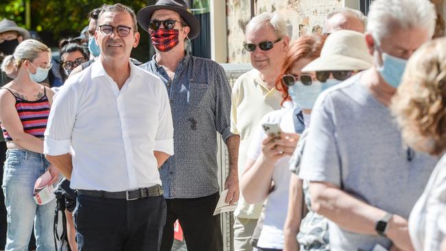 Steven Marshall in a queue prior to voting in the the state election at Norwood Primary School. Picture: NCA NewsWire / Brenton Edwards