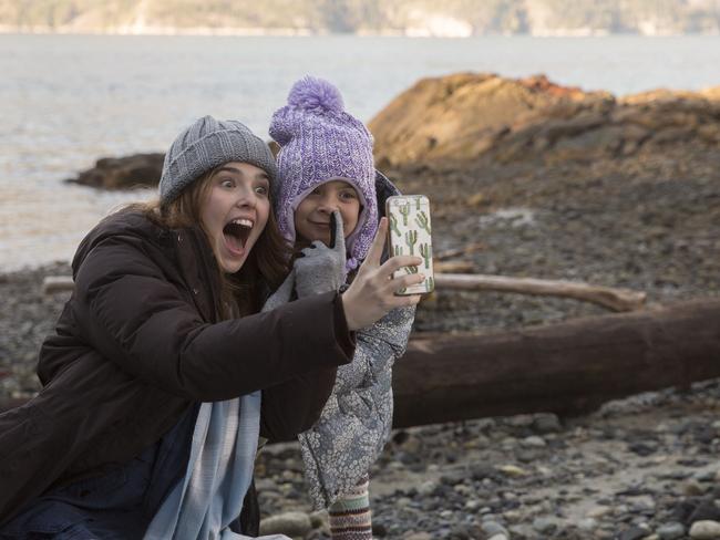 Deutch takes a selfie with Erica Tremblay as teens do. Picture: Village Roadshow Films