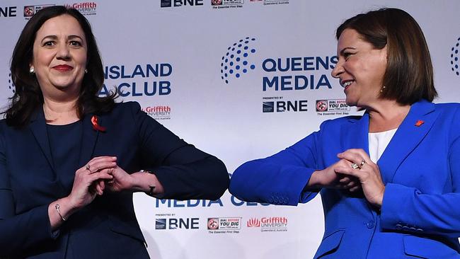 BRISBANE, AUSTRALIA - NewsWire Photos - OCTOBER 30, 2020.Queensland Premier Annastacia Palaszczuk (left) and opposition Leader Deb Frecklington pose for a photo at the conclusion of a leadersÃ debate, ahead of the state election on October 31, at the Brisbane Convention & Exhibition Centre. Picture: NCA NewsWire / Dan Peled