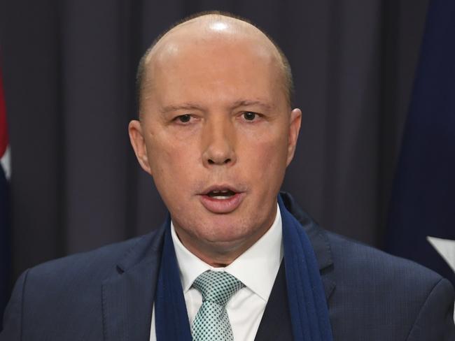 Australian Home Affairs Minister Peter Dutton speaks during a press conference at Parliament House in Canberra, Wednesday, December 12, 2018. Mr Dutton today announced Major General Craig Furini as new Operation Sovereign Borders commander taking over from Air Vice-Marsha Stephen Osborne. (AAP Image/Lukas Coch) NO ARCHIVING