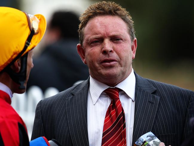 Races at Caulfield Race course. Trainer Robbie Laing talks to jockey Damien Oliver. Picture: Tim Carrafa