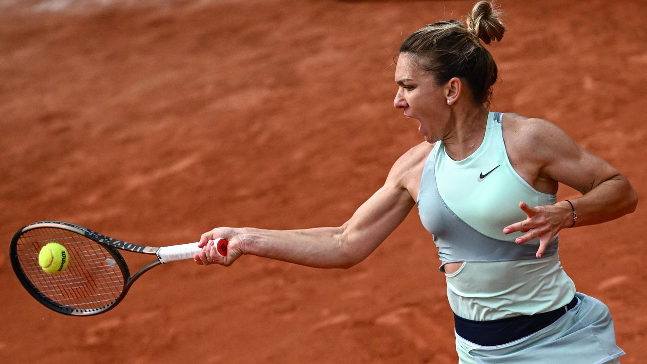 Halep ranks 11th all-time for weeks ranked No. 1. (Photo by Anne-Christine POUJOULAT / AFP)