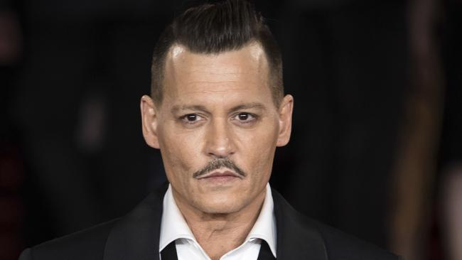 Johnny Depp has settled his multimillion-dollar lawsuit against his former business managers. Picture: Vianney Le Caer/Invision/AP