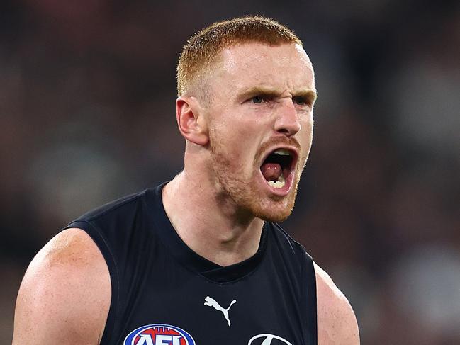 MELBOURNE, AUSTRALIA - MAY 03: Matthew Cottrell of the Blues celebrates kicking a goal during the round eight AFL match between Carlton Blues and Collingwood Magpies at Melbourne Cricket Ground, on May 03, 2024, in Melbourne, Australia. (Photo by Quinn Rooney/Getty Images)