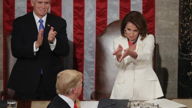 WASHINGTON, DC - FEBRUARY 05: Vice President Mike Pence and Speaker Nancy Pelosi greet President Donald Trump just ahead of the State of the Union address in the chamber of the U.S. House of Representatives at the U.S. Capitol Building on February 5, 2019 in Washington, DC. President Trump's second State of the Union address was postponed one week due to the partial government shutdown.   Chip Somodevilla/Getty Images/AFP == FOR NEWSPAPERS, INTERNET, TELCOS & TELEVISION USE ONLY ==