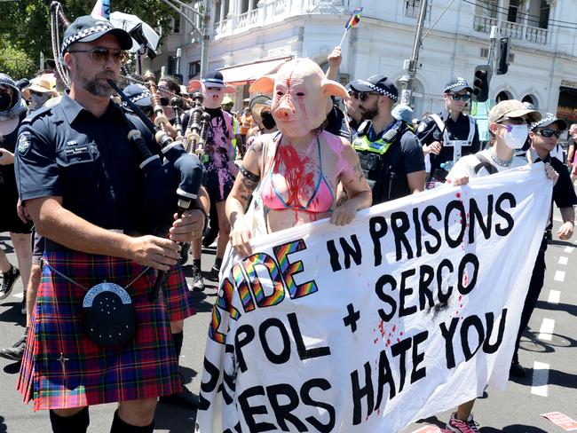 A small group of protesters clash with police who were marching in the Midsumma Pride Parade along Fitzroy Street St Kilda. Picture: Andrew Henshaw