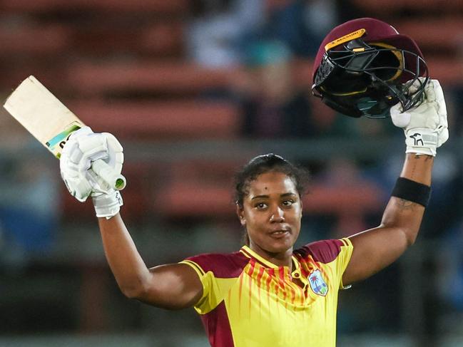 Hayley Matthews of the West Indies reacts after reaching her century during the T20 international women cricket match against Australia at the North Sydney Oval in Sydney on October 2, 2023. (Photo by DAVID GRAY / AFP) / -- IMAGE RESTRICTED TO EDITORIAL USE - STRICTLY NO COMMERCIAL USE --