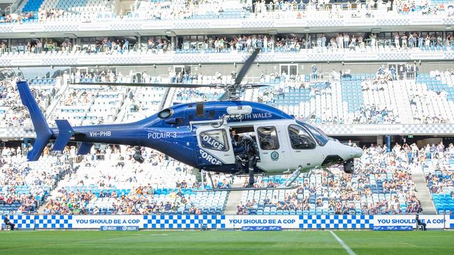 The helicopter bearing Inspector Scott arrives at Allianz Stadium. Picture; Thomas Lisson