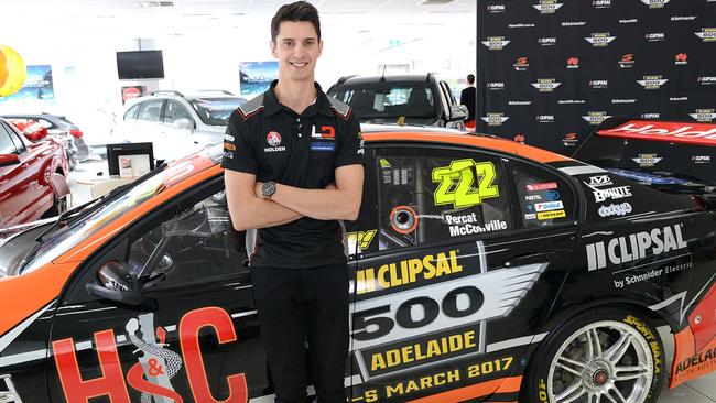 Nick Percat in front of his new state-branded car.