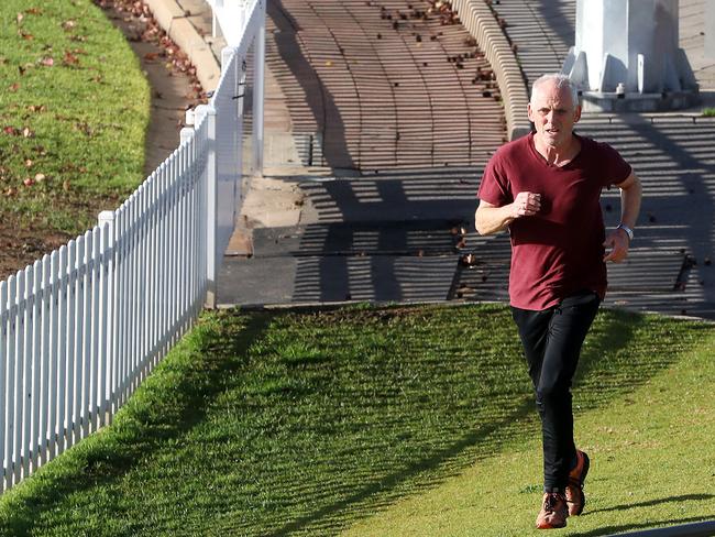 A man jogs at Unley Oval on Wednesday. Picture: Sarah Reed