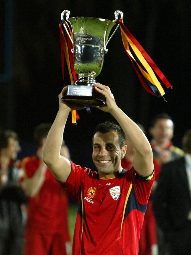 Former Adelaide United skipper Ross Aloisi holding the A-League’s pre season cup aloft in 2006.