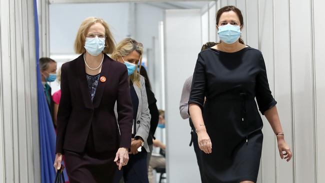 Chief Health Officer Jeannette Young and Premier Annastacia Palaszczuk leave a Covid-19 vaccination hub on the Gold Coast. (NCA NewsWire /Jono Searle)