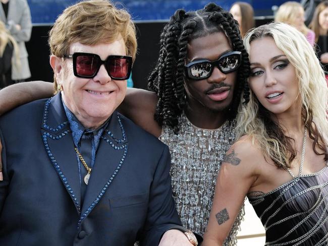 Elton John, Lil Nas X, Miley Cyrus. Picture: Shutterstock/The Times