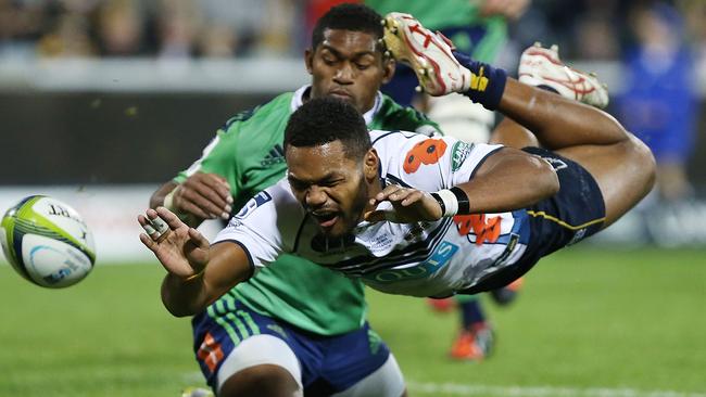 Henry Speight of the Brumbies drops the ball while attempting to score a try.