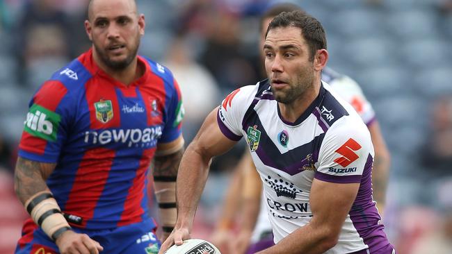 Cameron Smith runs the ball for the Storm.