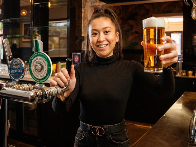 19/5/2020 Julienne Vargas getting ready to pour beers at the Sussex Hotel, Walkerville. Picture MATT TURNER.