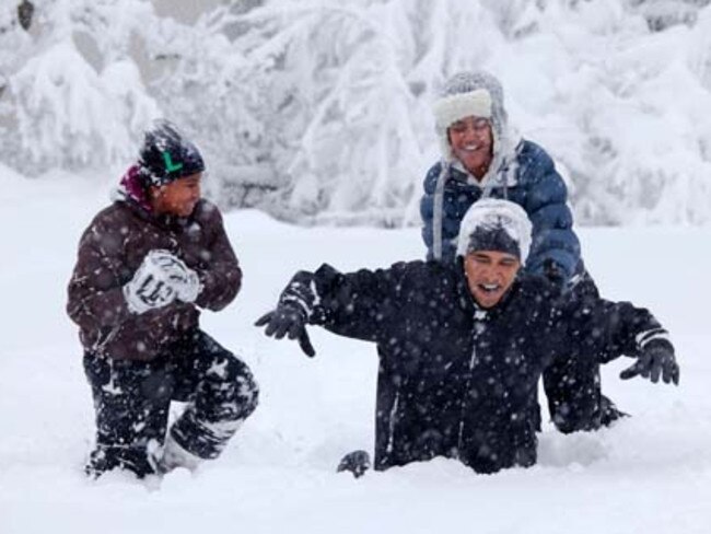 Feb. 6, 2010: “Another snowstorm blanketed Washington for the second time in a few days. Because it was a Saturday, I hung around the White House thinking that the President might venture out in the snow with his daughters. Here they are playing in the Rose Garden in the midst of the storm.” Picture: Official White House Photo by Pete Souza