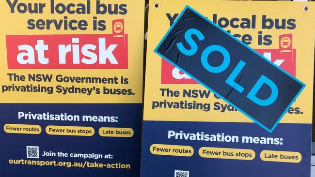 Signs at the anti-public bus privatisation demonstration outside NSW Liberal MP for Wakehurst, Brad Hazzard's electorate office at Dee Why. Critics of the plan say unproftable routes on the northern beahces will be axed. Picture: Jim O'Rourke