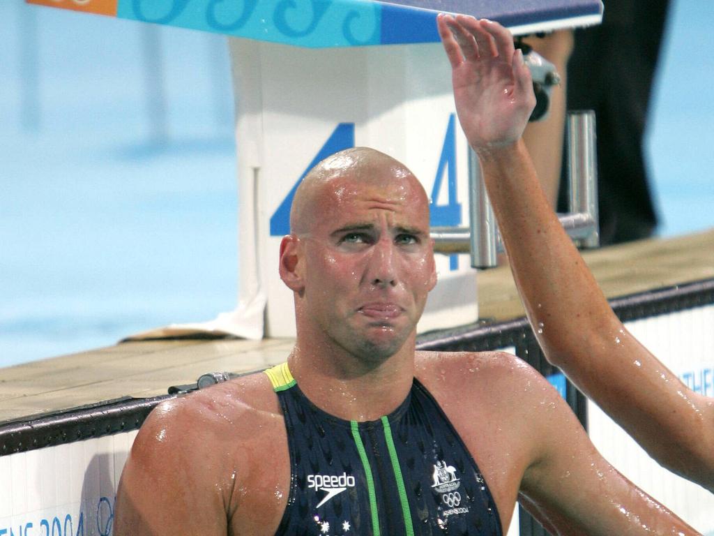 Grant Hackett points to his chest after 2004 Athens Olympic gold in the 1500m freestyle. Picture: Greg Porteus.