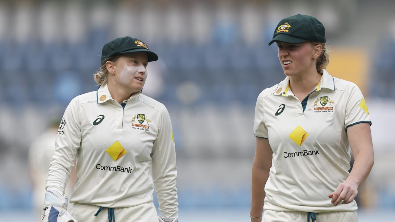 Alyssa Healy and Kim Garth during a break in play at Wankhede Stadium. Picture: Pankaj Nangia/Getty Images