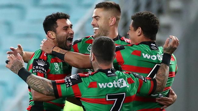 Alex Johnston celebrates a try with his Rabbitohs teammates. Picture: Cameron Spencer/Getty Images