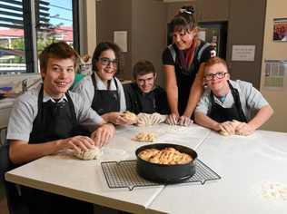 AT WORK: Sam Green, Chloe Coles, James Bould, teacher Kat White and Angus Birrell take part in the Kneaded program every Friday at Ipswich State High School. Picture: Rob Williams