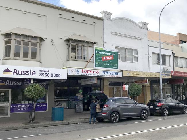 The shops on the right, in Sydney Rd, are part of the proposed redevelopment. Picture: Manly Daily