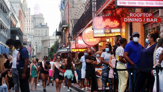 Restaurant managers and hosts are being assigned a new job -- vaccination police -- and it’s dividing businesses and customers. Picture: Mario Tama/Getty Images/AFP