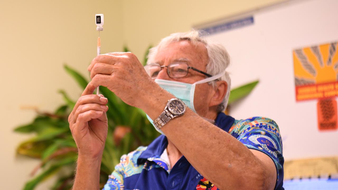 Dr Peter Westawood draws up a Covid-19 vaccination as the town nears 100 per cent first dose. Picture: Amanda Parkinson