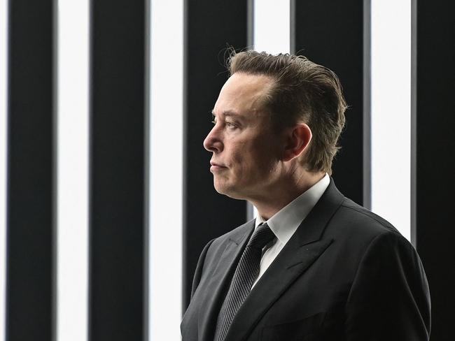 (FILES) In this file photo taken on March 22, 2022 Tesla CEO Elon Musk is pictured as he attends the start of the production at Tesla's "Gigafactory" in Gruenheide, southeast of Berlin. - Billionaire Elon Musk will address Twitter employees at a meeting this week, the company confirmed June 14, 2022, in a first since launching his troubled $44 billion bid for the social media platform. (Photo by Patrick Pleul / POOL / AFP)