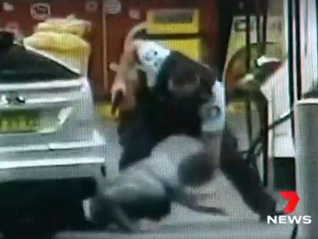 CCTV images of the arrest in Empire Bay, where a man allegedly rammed a petrol bowser. Picture: 7 NEWS