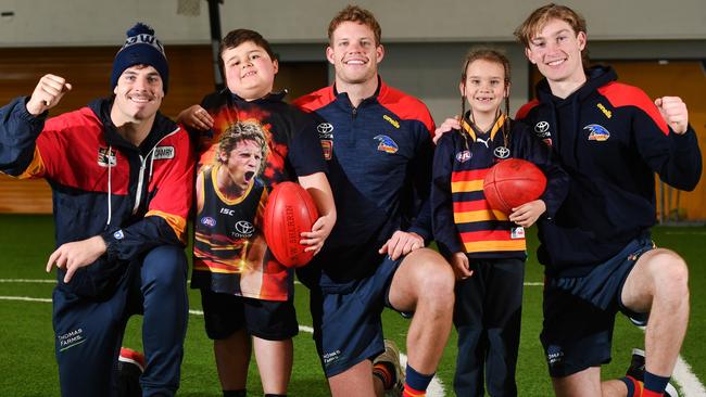 Crows star Darcy Forgarty, competition winner Dominic Blucher, 8, Mitch Hinge, Bryce Winmar 6, and Max Machalanney. Picture: Keryn Stevens