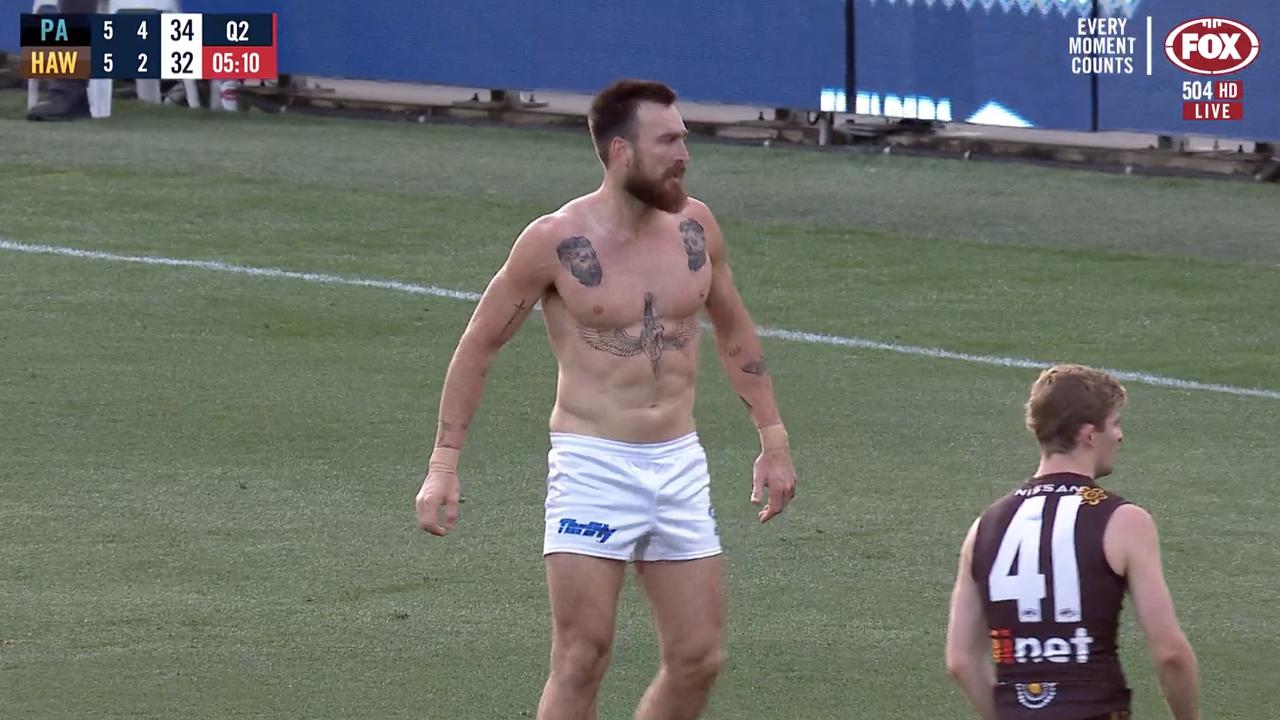 Charlie Dixon was left shirtless after a skirmish that could see him in hot water.